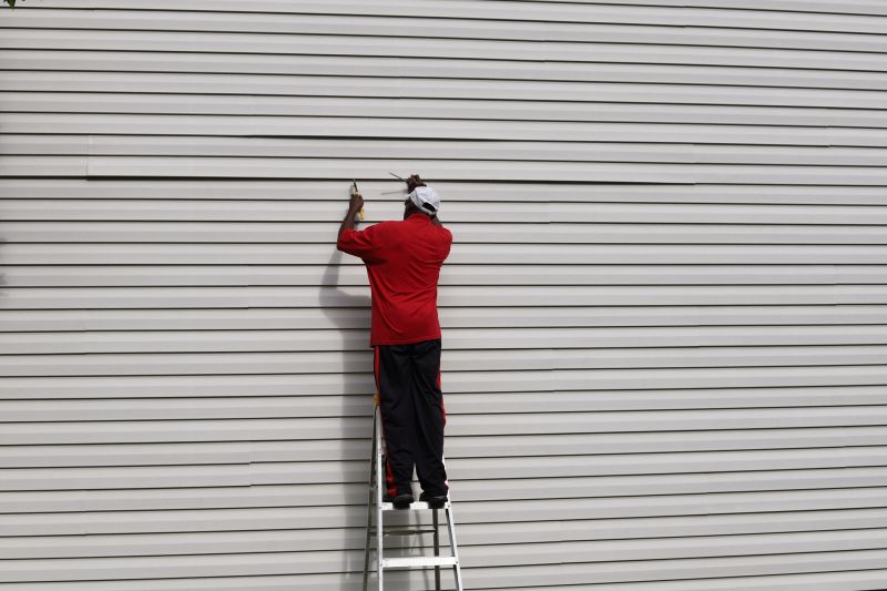 Skilled Siding Technician